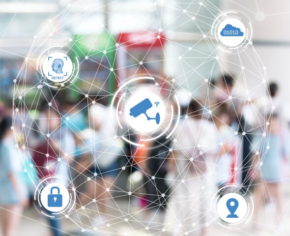 Icons depicting security superimposed on a blurry image of a crowd of people