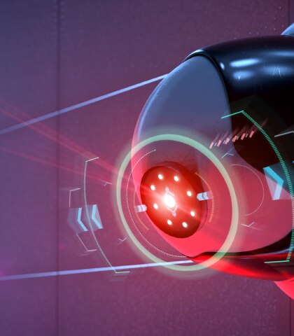 A red light emitting out of a surveillance camera