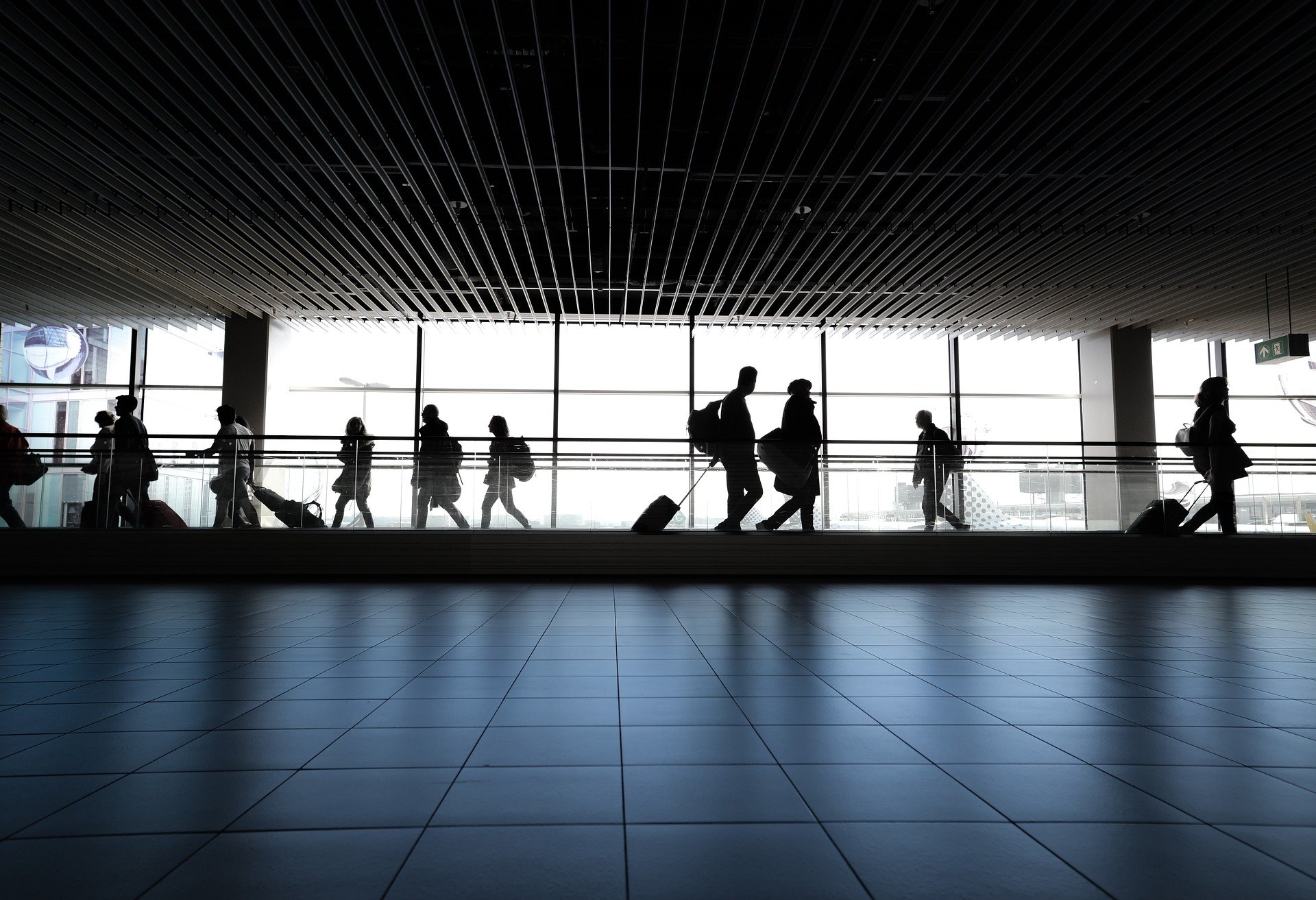 Airport - Access Control - people walking at an airport Airport - Access Control - people walking at an airport
