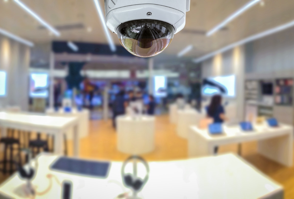 A surveillance camera installed in an electronics store